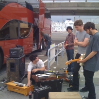 The Foals play an impromptu gig at Calais docks after a side window breaks.